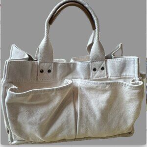 White canvas purse with long crossbody strap